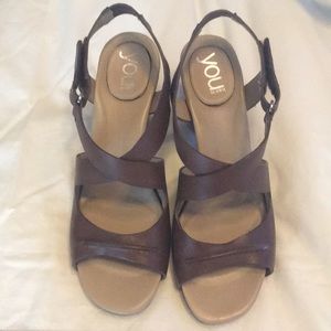 Brown sandals by crocs